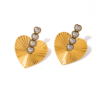 Boucles d'oreilles doré 4 coeurs & zircone